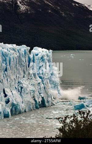 Pieces of ice of Perito Moreno Glacier collapsing in Lake Argentino, Argentine Patagonia Stock Photo
