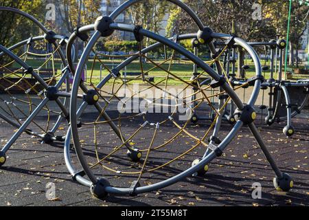 Kids playground in an urban park in Italy Stock Photo