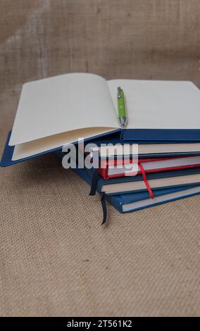 Close-up, notebook and textbooks on table, education concept. a ctack of notebooks folded on the table Stock Photo