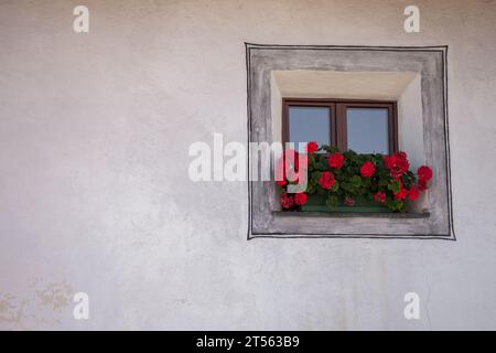 traditional balcony from an old house in a mountain town from the Dolomites area Stock Photo