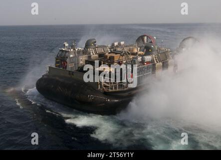 Landing Craft Unit departs the well deck of the amphibious assault ship ...