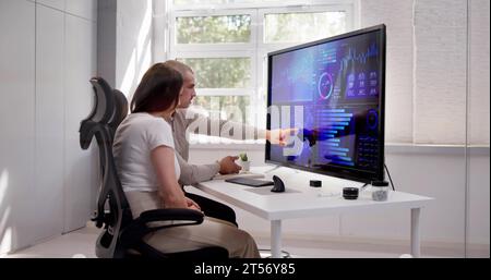 Data Analyst Using Data Analytics KPI Dashboard Stock Photo