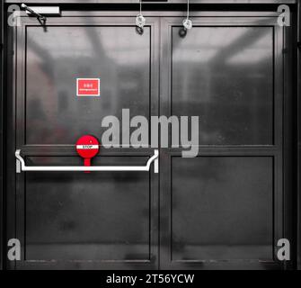 Decaying Elegance: Textured Emergency Exit Door. Metal Surface Stock Photo