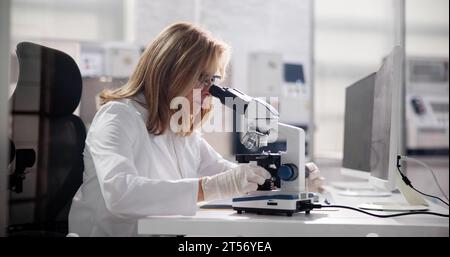 Female Computer Scientist Conducts Research in Hospital Lab Stock Photo