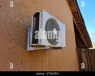 Air Conditioner Split HVAC System Unit On House In Africa Stock Photo