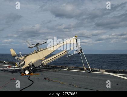 US Navy A Scan Eagle unmanned aerial vehicle (UAV) is launched from the flight deck for simulated reconnaissance.jpg Stock Photo