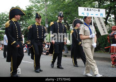 US Navy ailors from Fleet Activities Yokosuka, dressed as members of the official party of Commodore Matthew C. Perry during his arrival to Japan, march in the Tokyo Jidai Matsuri Parade in Asakusa.jpg Stock Photo