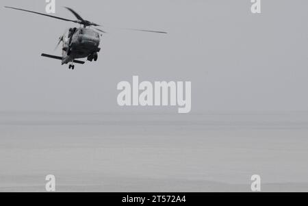 US Navy An SH-60F Seahawk helicopter assigned to the.jpg Stock Photo