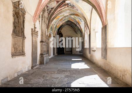 Novacella Augustinian Abbey. The Gothic cloister with from valuable ...