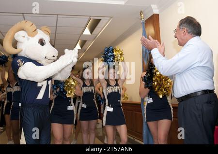 US Navy Secretary of Defense (SECDEF) Leon Panetta is greeted by Bill the Goat, the U.S. Naval Academy mascot, the Naval Academy.jpg Stock Photo