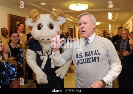US Navy Secretary of the Navy (SECNAV) the Honorable Ray Mabus speaks with Bill the Goat, the U.S. Naval Academy mascot, the U.S.jpg Stock Photo