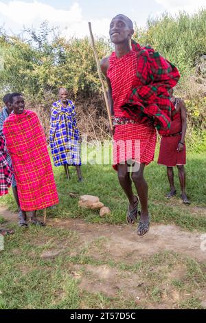 MASAI MARA, KENYA - FEBRUARY 20, 2020: Masai people perform their Jumping Dance, Kenya Stock Photo