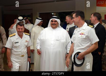 US Navy Vice Adm. Bill Gortney, commander, U.S. Naval Forces Central Command, welcomes Bahrain's Minister of Foreign Affairs, His Excellency Shaikh Khalid Bin Ahmad Bin Mohammed Al-Khalifa to the command's he.jpg Stock Photo