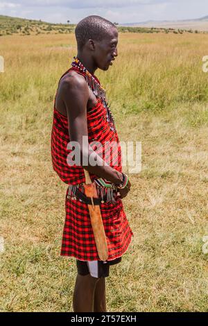 MASAI MARA, KENYA - FEBRUARY 19, 2020: Masai tribe member in Masai Mara National Reserve, Kenya Stock Photo
