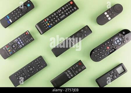 Various remote controls flat lay Stock Photo