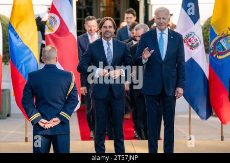 US President Joe Biden (R)and President of Uruguay Luis Lacalle Pou (L) arrive for the family photo at the inaugural Americas Partnership for Economic Prosperity LeadersÕ Summit on the South Portico of the White House in Washington, DC, USA, 03 November 2023. The summit is aimed to deepen the mutual benefit in trade, manufacturing, immigration and other sectors among the Western Hemisphere nations. Stock Photo