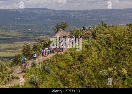 LONGONOT, KENYA - FEBRUARY 15 2020: Children hiking at the rim of Longonot volcano, Kenya Stock Photo