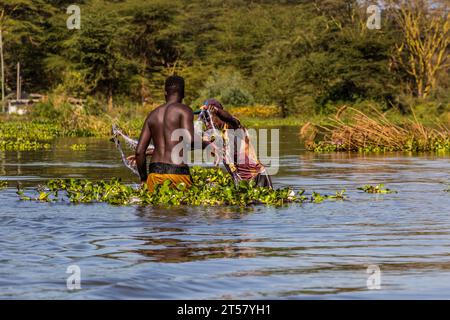 NAIVASHA, KENYA - FEBRUARY 17, 2020: Fishermen on Naivasha lake, Kenya Stock Photo