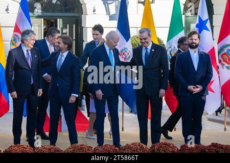 United States President Joe Biden, center, Luis Abinader, President of the Dominican Republic, second right, and President Gabriel Boric of Chile take their places for a family photo with other leaders from the Western Hemisphere while meeting during the inaugural Americas Partnership for Economic Prosperity Leaders Summit at the White House in Washington, DC, on Friday, November 3, 2023. Also pictured at left center is President Luis Lacalle Pou of Uruguay. Prime Minister Justin Trudeau of Canada, is in rear center behind President Biden. Copyright: xChrisxKleponisx/xCNPx/MediaPunchx Stock Photo