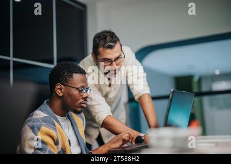 Business Team Collaboration in a Multicultural Board Room Meeting. Successful Businessmen Work Together in International Start up Office. Stock Photo