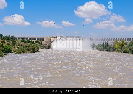 Open sluices on the Vaal dam in South Africa after good rains. Stock Photo