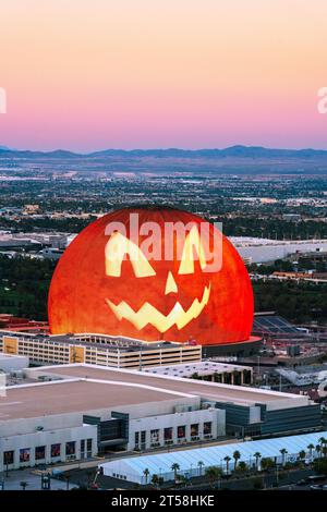 The Sphere, Exosphere is nightly used to display art and advertising Jack O Lantern, Pumkin Aerial View of Skyline, Strip at Night, Neon Lights  Las V Stock Photo