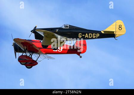 A 1930's Miles Hawk Speed 6 racing aircraft in formation with a Travel Air Type R Mystery ship Stock Photo