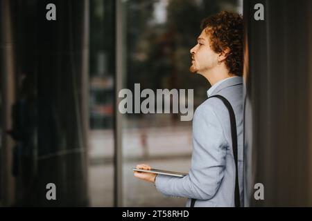 Innovative Architects Collaborating on Construction Blueprint Stock Photo