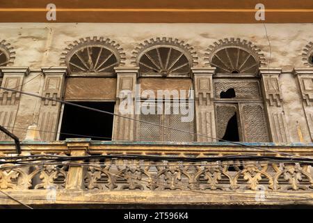 A balcony and windows of an abandoned house in the Armenian quarter, Bourj Hammoud, in Beirut, Lebanon. Stock Photo