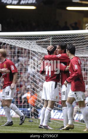 RUUD VAN NISTELROOY, FA CUP FINAL, 2004:Van Nistelrooy and the other Manchester Utd players celebrate his second goal and his team's third,  FA Cup Final 2004, Manchester United v Millwall, May 22 2004. Man Utd won the final 3-0. Photograph: ROB WATKINS Stock Photo