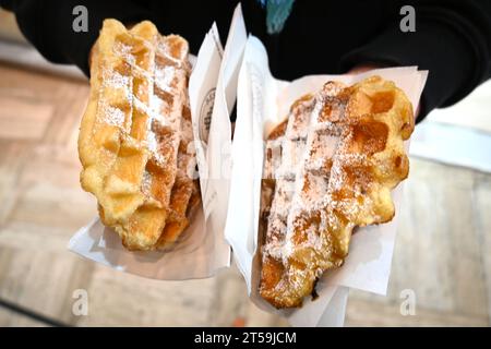 Belgian waffles covered with powdered confectioners sugar – Brussels Belgium Stock Photo