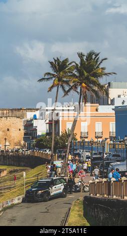 Police monitor tourists at entrance to La Perla Old San Juan Puerto Rico Stock Photo