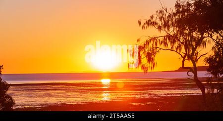 Sunrise over mud flats Stock Photo