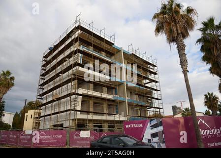 CYPRUS, PAPHOS-19 MARCH: Paphos is a coastal city in southwestern Cyprus, located on the Mediterranean coast. A view of the unfinished apartment build Stock Photo