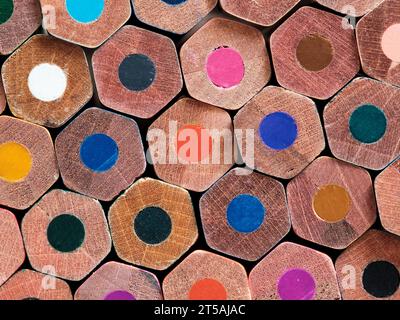 Stack of colorful crayons. Back to school wallpaper background concept. Colored pencils. Stock Photo