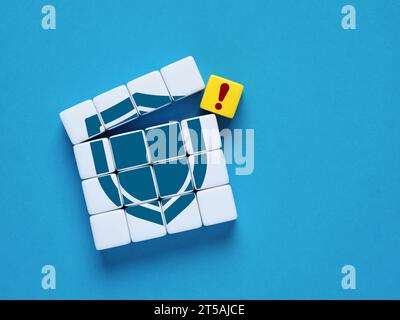 Hacking and security system breakdown. Weakened defense and protection. Vulnerability to threats. Stock Photo