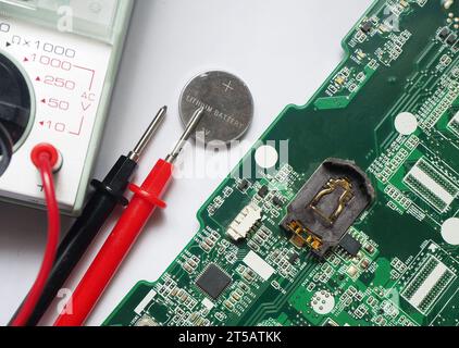 3 Volts lithium battery. Battery-backed electronic devices. Batteries to maintain volatile memory when powered off. Stock Photo