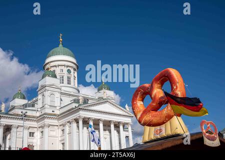 Pretzel sign and Helsinki Cathedral at International Grand Market in Helsinki, Finland Stock Photo