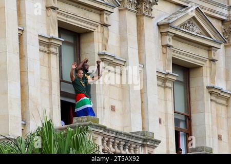 CAPE TOWN, SOUTH AFRICA - NOVEMBER 03: Cheslin Kolbe and Siya Kolisi on the balcony of the City Hall waving to the crowds below during the Springbok Trophy tour in Cape Town on November 03, 2023 in Cape Town, South Africa. The Springboks beat the New Zealand All Blacks 12-11 to win the Rugby World Cup in Paris, France on Saturday 28 October 2023. (Photo by Roger Sedres) Stock Photo