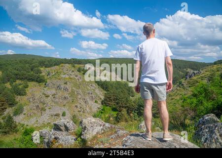 Man at the viewpoint. La Morcuera mountain pass, Madrid province, Spain. Stock Photo