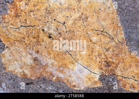 Colours, textures and patterns on a natural stone. Stone background. Stock Photo