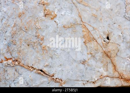 Colours, textures and patterns on a natural stone. Stone background. Stock Photo