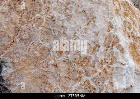 Colours, textures and patterns on a natural stone. Stone background. Stock Photo