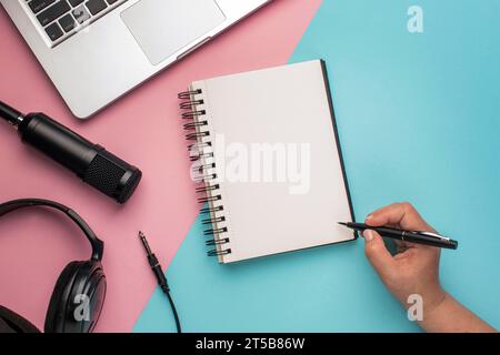 Person with pen notepad air radio concept Stock Photo