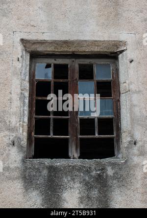 Old window with broken panes, France Stock Photo