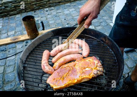 Sausages and schnitzels are turned with the folding rule, near Cologne, Germany Stock Photo