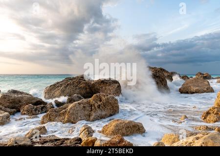 Big waves crushing on the big rocks on Kavalikefta Beach, Lefkada, Greece. Stock Photo