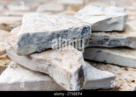 Close up of worked natural stones for paving. Stock Photo
