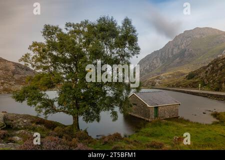 Llyn Ogwen, a ribbon lake in the heart of Snowdonia National Park. The lake is surrounded by rugged mountains and is a popular destination for hikers, Stock Photo