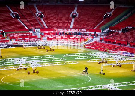 MUFC Manchester United FC ground pitch being treated after a game. . Stock Photo